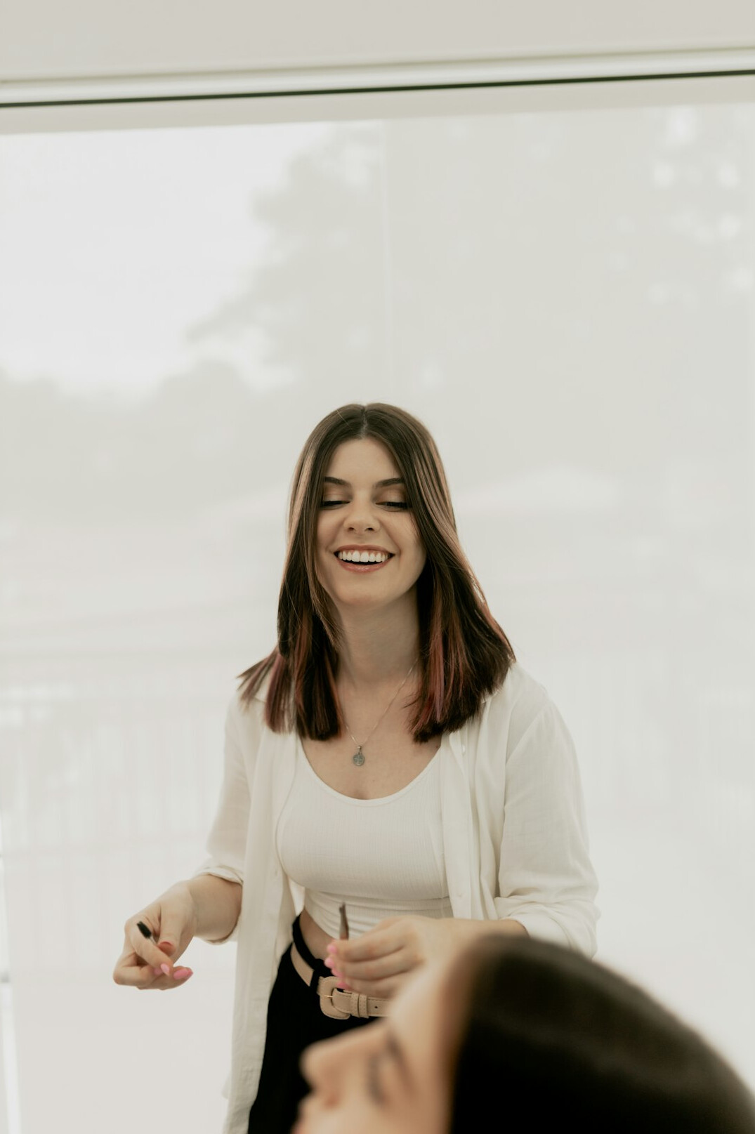 confident person smiling in discussion
